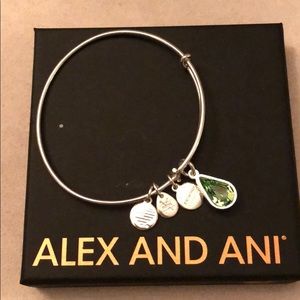 Never worn!  Alex and Ani birthday stone bracelet